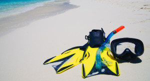 Diving Mask with fins on beach